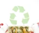 Green recycling symbol made of paper with waste items like banana peels, soda cans, and food wrappers around it, representing eco-friendly waste segregation. Crystal Bio Septic Tank